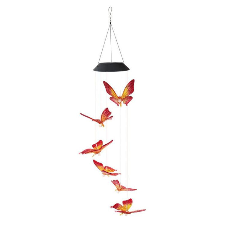 Solar-powered butterfly wind chime on a white background