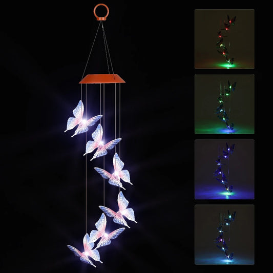 Butterfly-shaped LED solar light hanging against a dark background with color-changing capabilities.