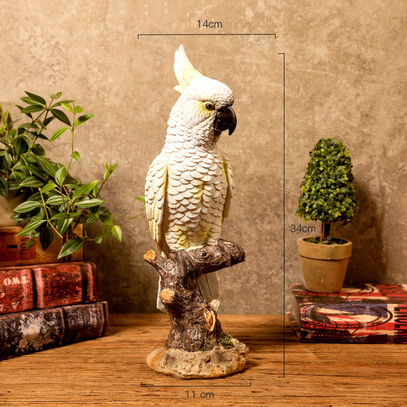 Decorative parrot statue with measurements on a wooden surface