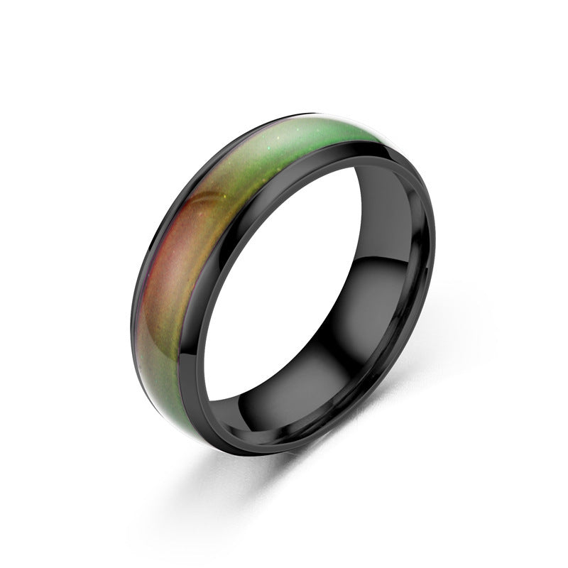Ring with black and green gradient on a white background