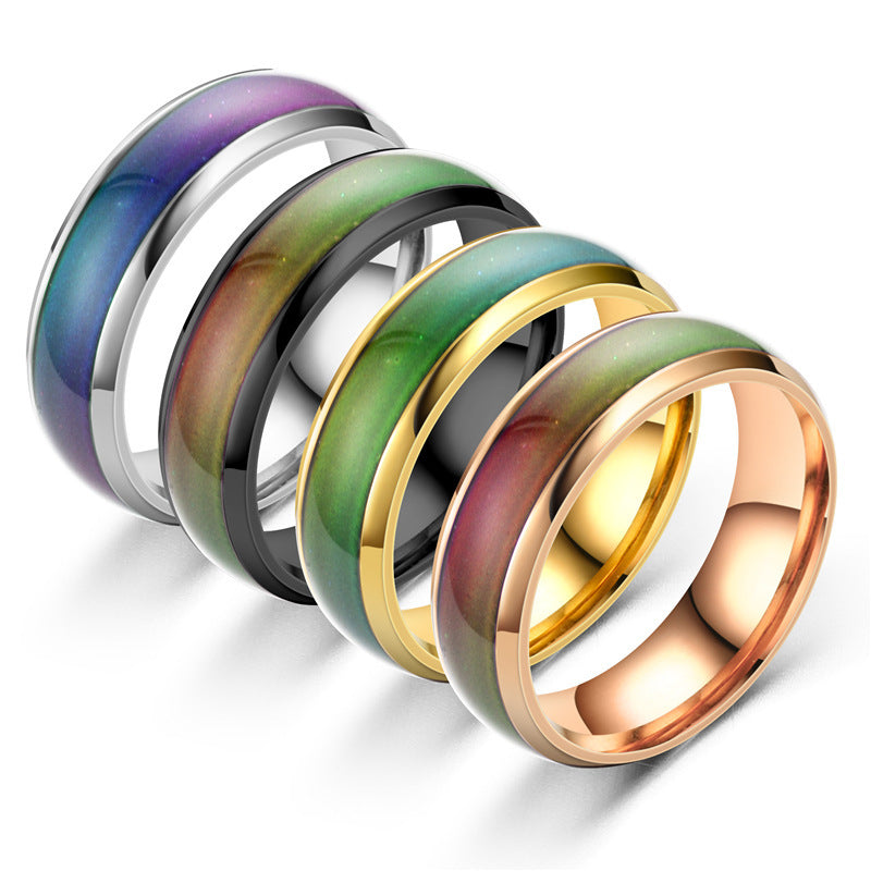 Set of five colorful rings with gradient designs on a white background