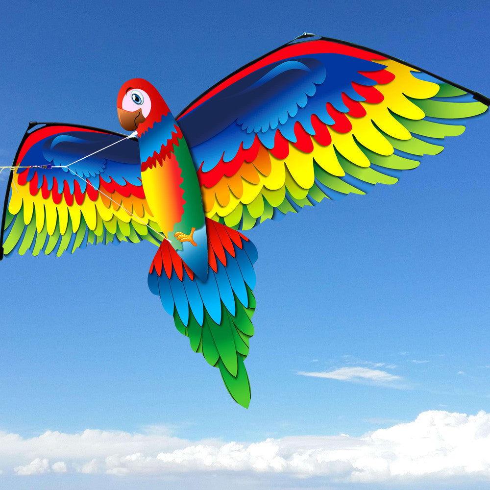 Colorful parrot-shaped kite flying against a blue sky with white clouds