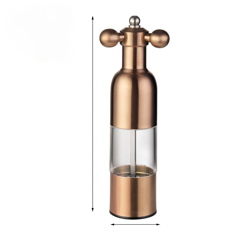 Bronze pepper grinder on a white background