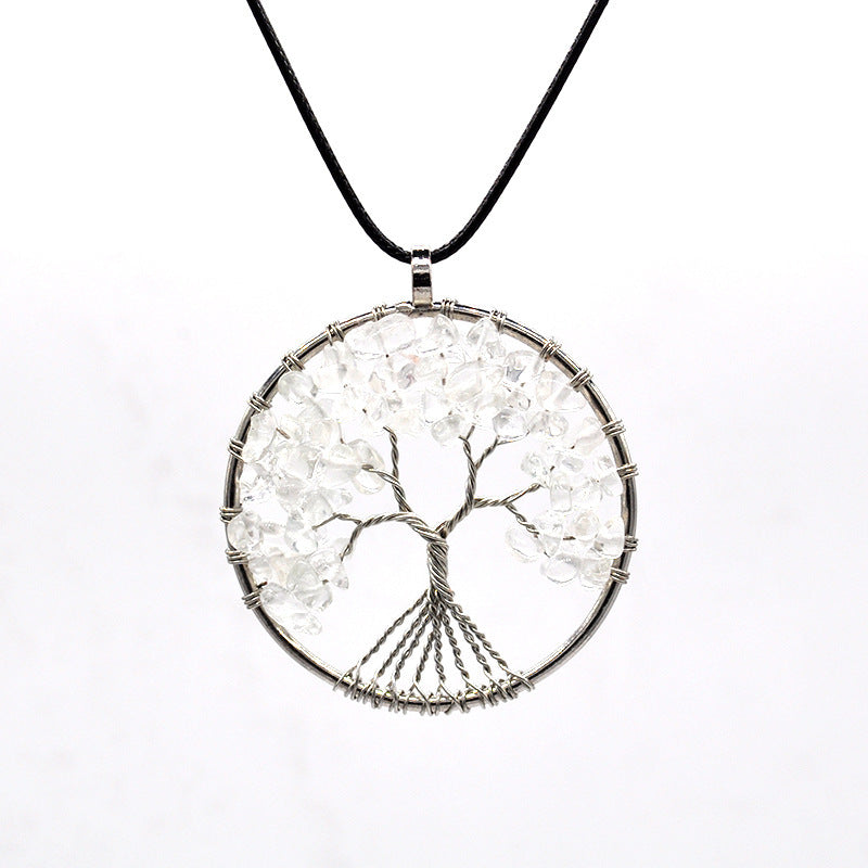 Tree-shaped pendant necklace on a white background