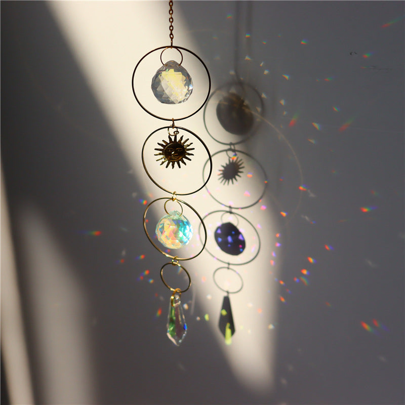 Decorative hanging with colorful crystal-like spheres on a dark background