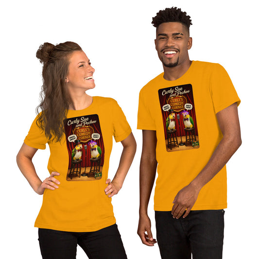 A man and a woman modeling matching yellow graphic T-shirts against a plain white background. The shirts feature a colorful printed design with two cartoon birds and the text 'Carly Sue the Triceratops'.
