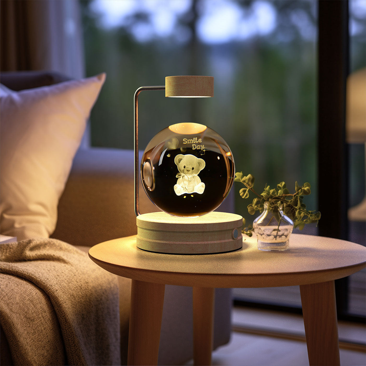 Decorative lamp with a teddy bear inside on a table in a living room setting.