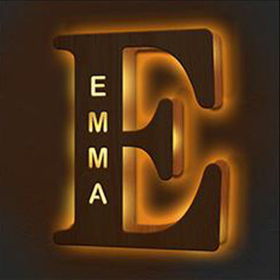 Neon sign with the word 'EMMA' inside a stylized letter 'E'.