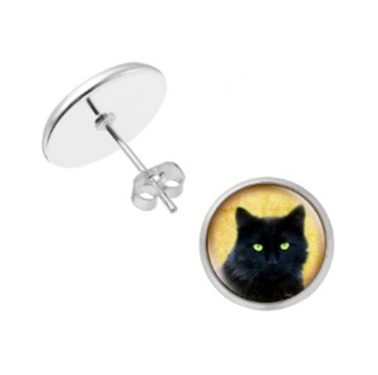 Earring with black cat design on a yellow background