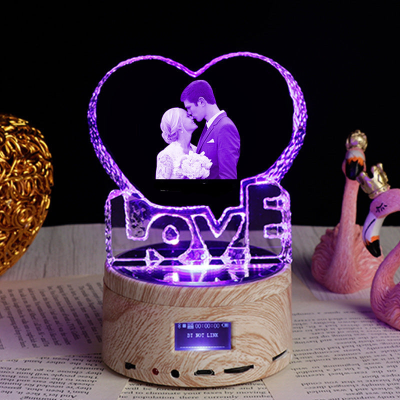 Heart-shaped LED lamp with a couple silhouette and 'Love you forever' text on a dark background.
