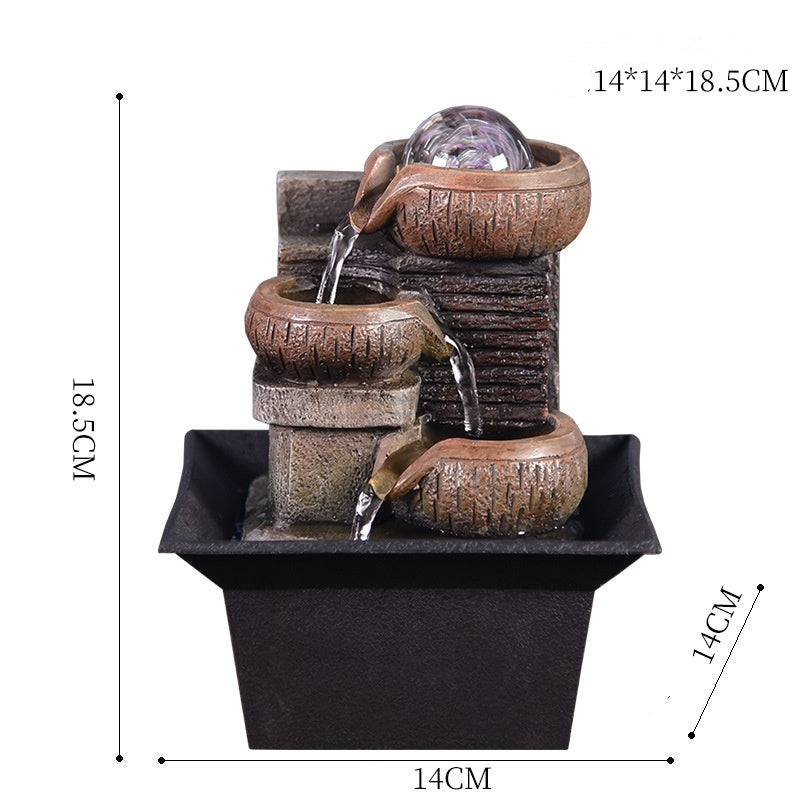 Decorative water fountain with dimensions on a white background