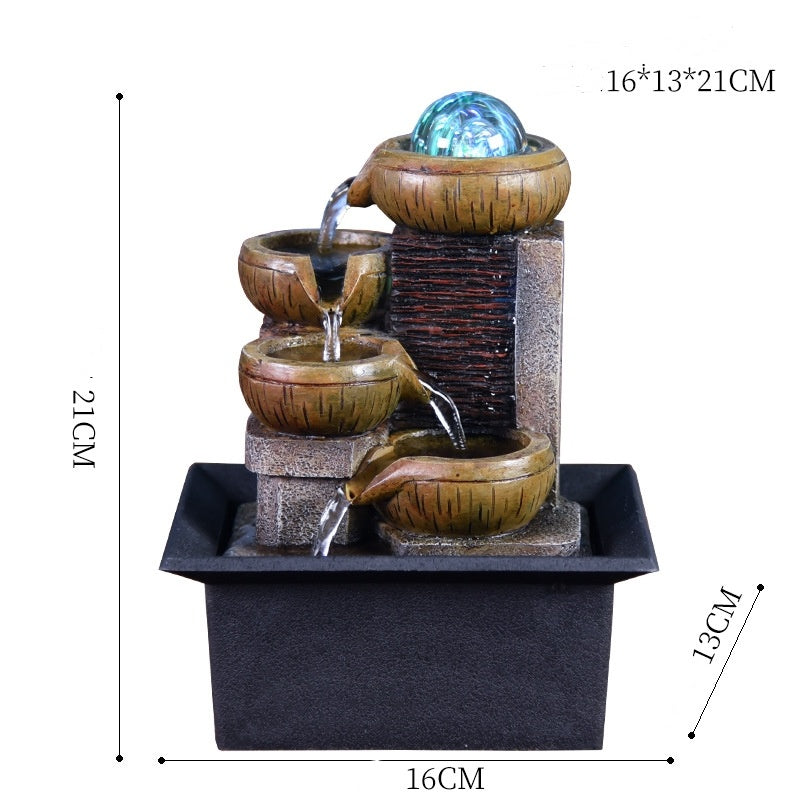 Decorative water fountain with dimensions on a white background