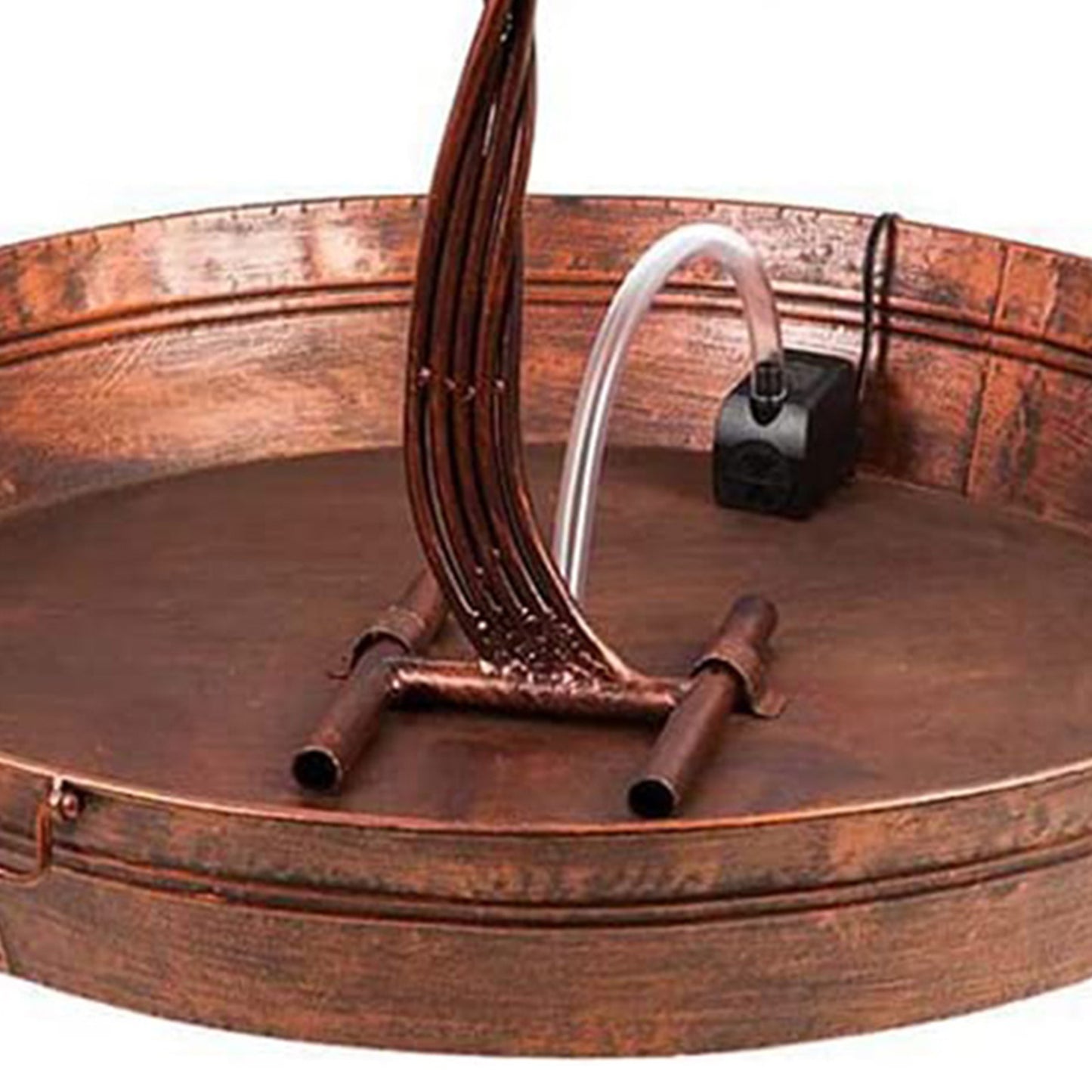Copper water feature with a pump and flowing water on a white background