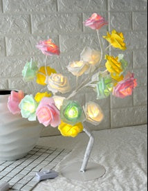 Decorative lamp with colorful flowers on a white brick wall background