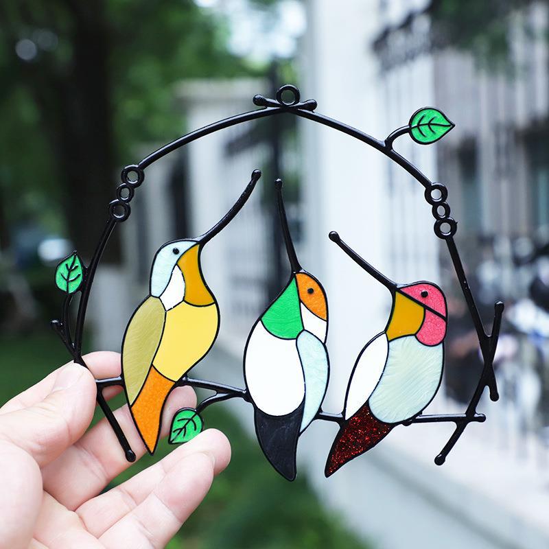 3 Decorative stained glass birds on a branch