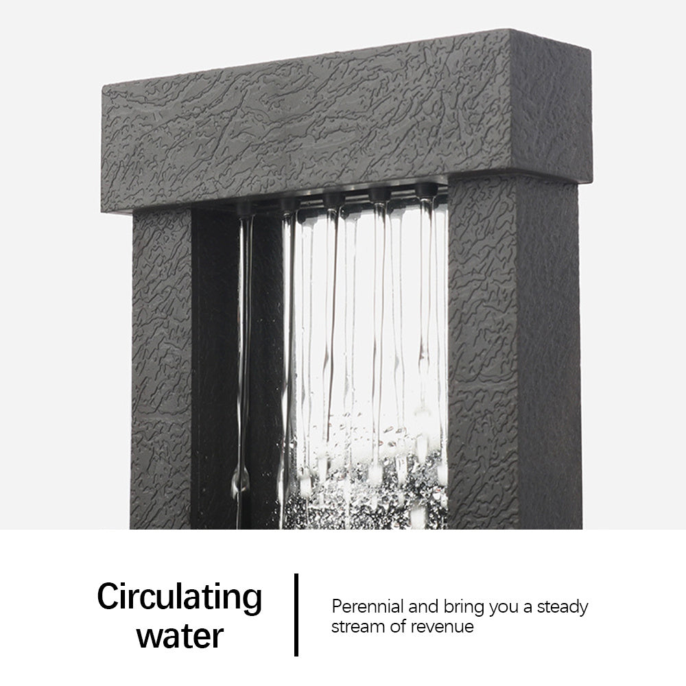 Decorative water feature with text about circulating water