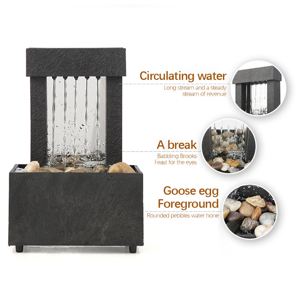 Tabletop water fountain with features highlighted on a white background