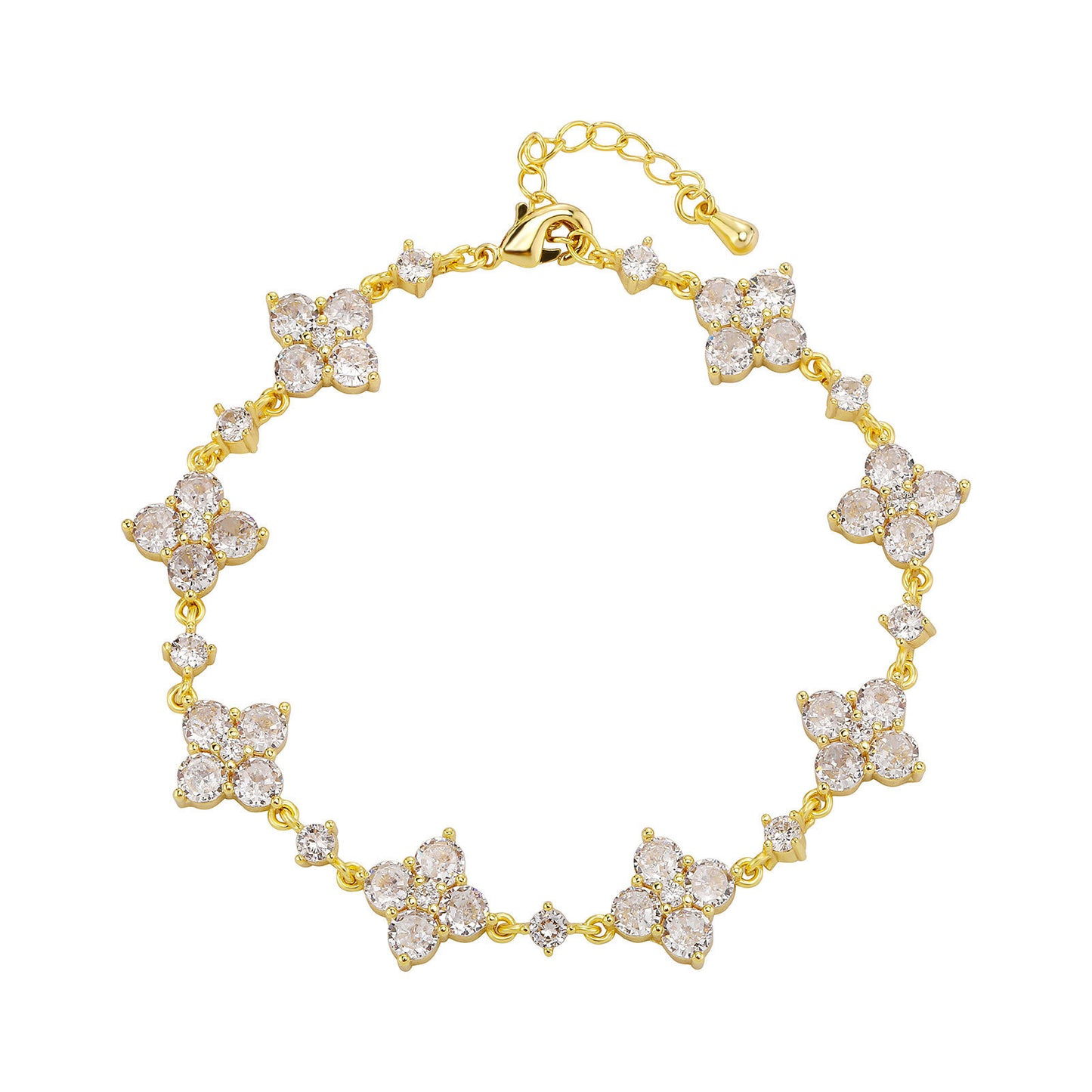 Gold bracelet with diamond-like stones on a white background
