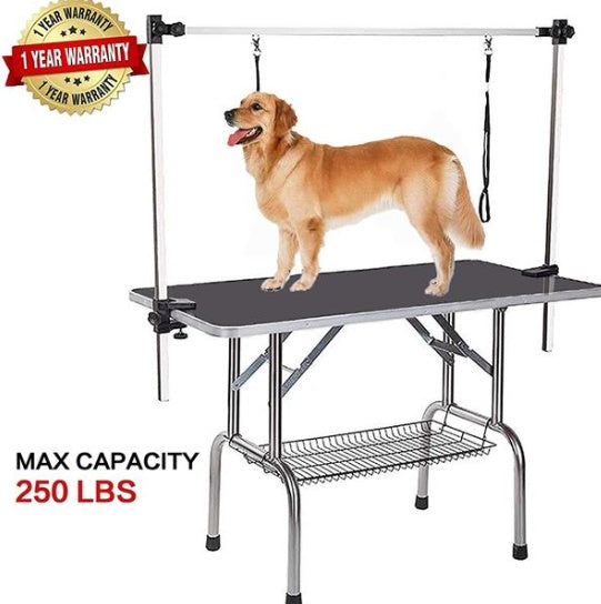 Dog grooming table with a dog on it, featuring a warranty badge and capacity information.