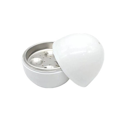 White ceramic grinder with metal interior on a white background