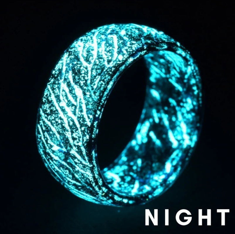 Glowing blue ring on a black background with 'NIGHT' text.