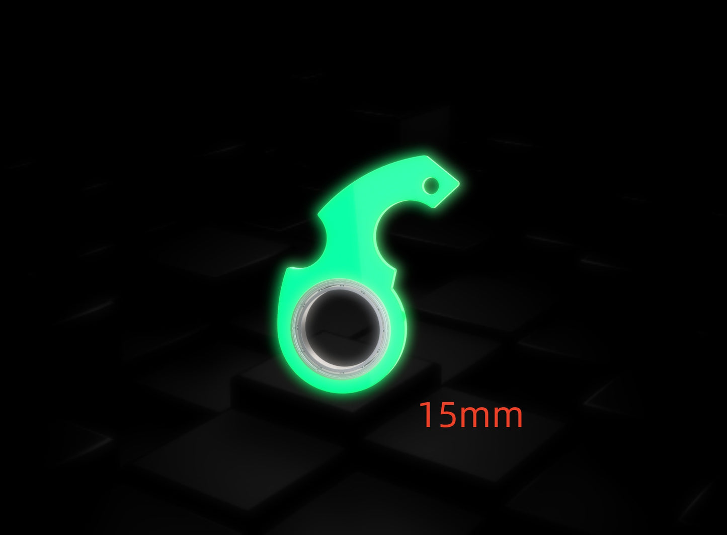 Green tool with '15mm' label on a dark background