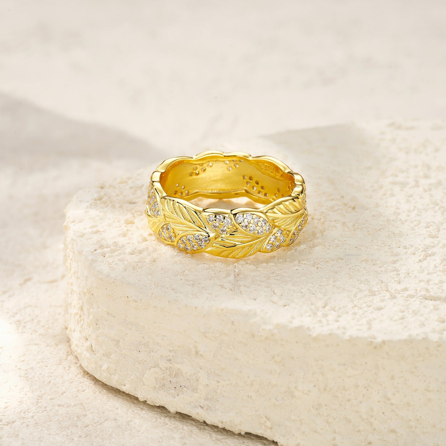 Gold-Plated S925 Silver Moissanite Leaf Band Ring on felt background
