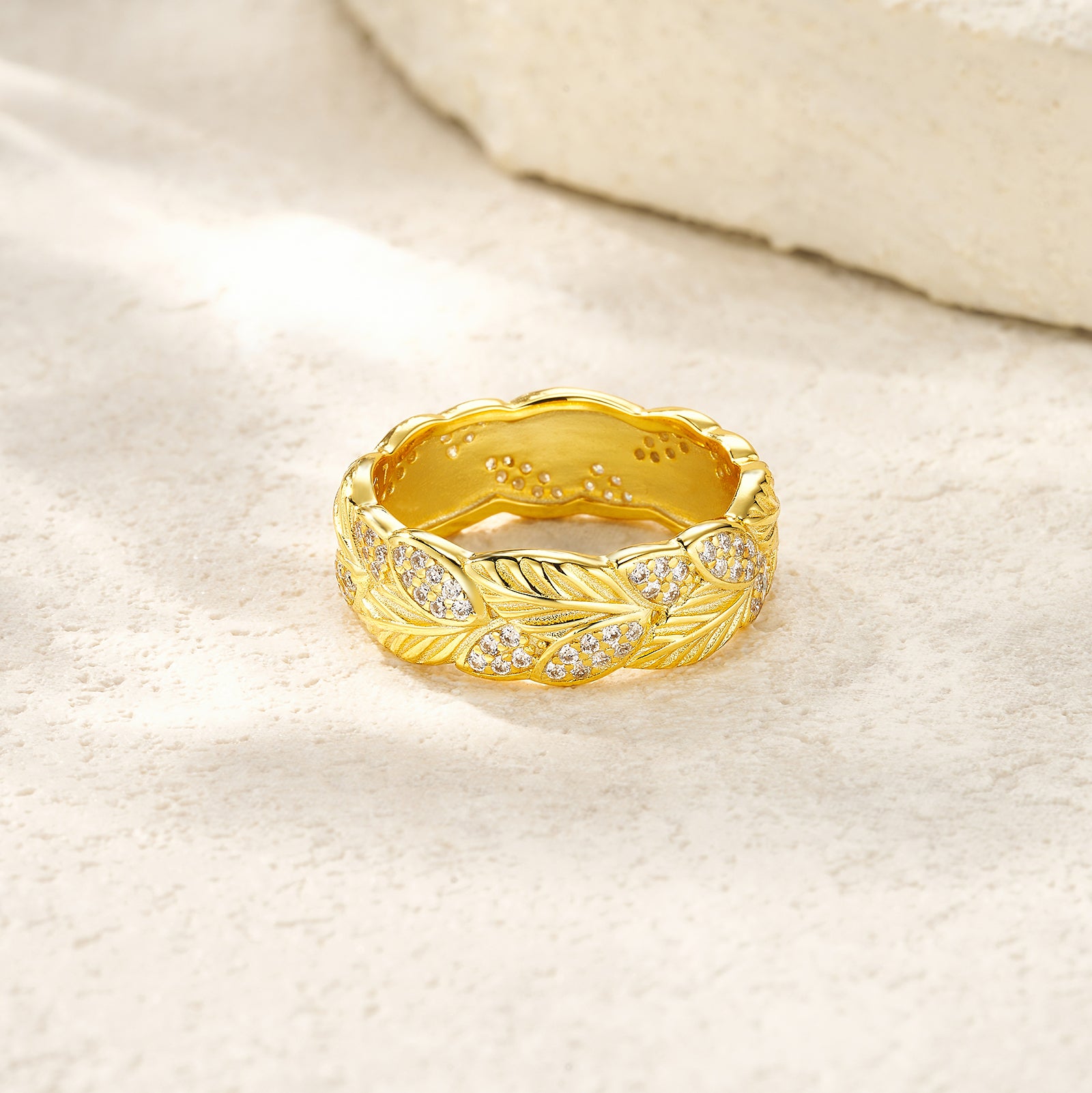 Gold-Plated S925 Silver Moissanite Leaf Band Ring on felt background