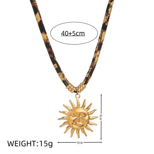 Necklace with a sun pendant and measurement details on a white background