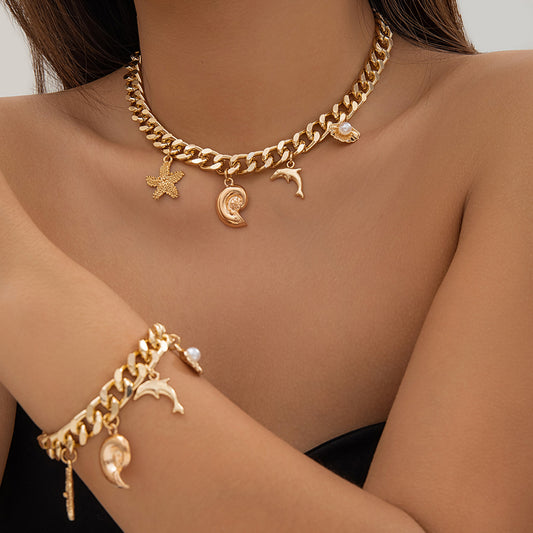 woman wearing Gold Boho Ocean Charm Choker Necklace & Bracelet Set