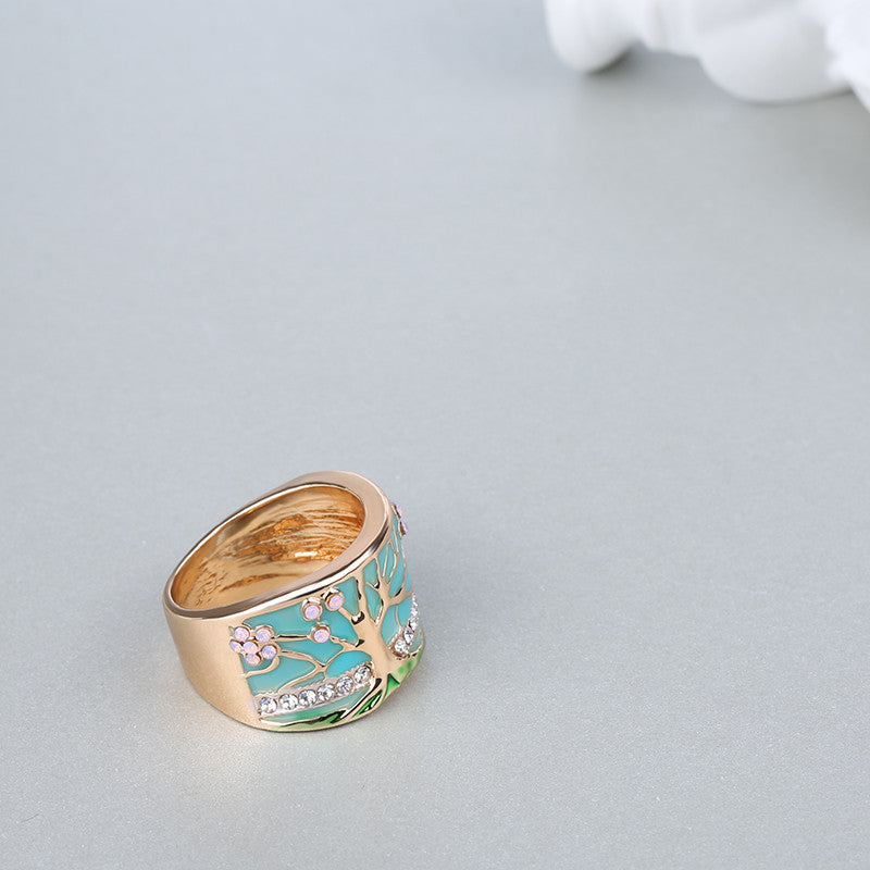 Gold Flower Tree Wide Ring with Green Enamel-Style Inlay on cloth