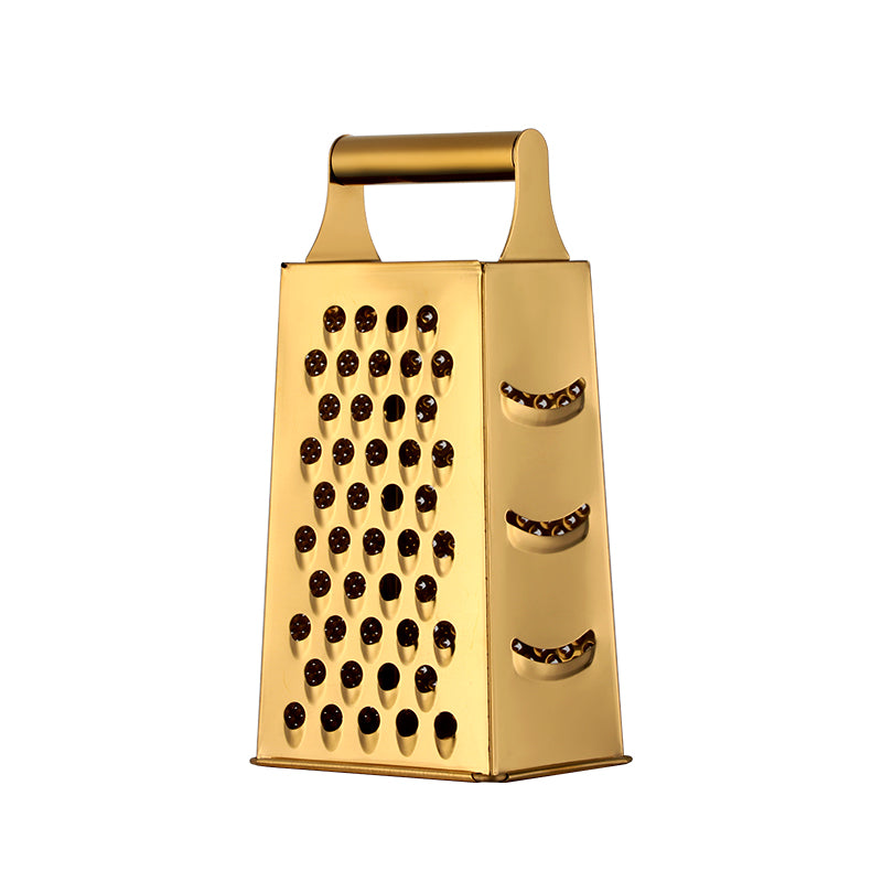 Gold box grater on a white background