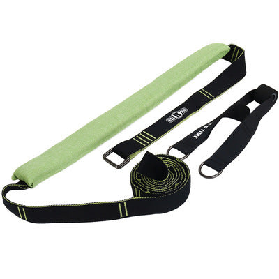 Green yoga mat with black straps on a white background