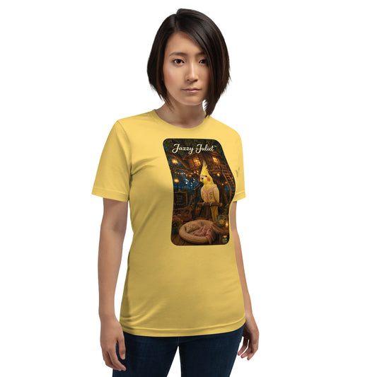 A woman modeling a yellow short-sleeve graphic T-shirt with a large rectangular print on the front featuring a cat and the text 'Jazzy Juliet'.