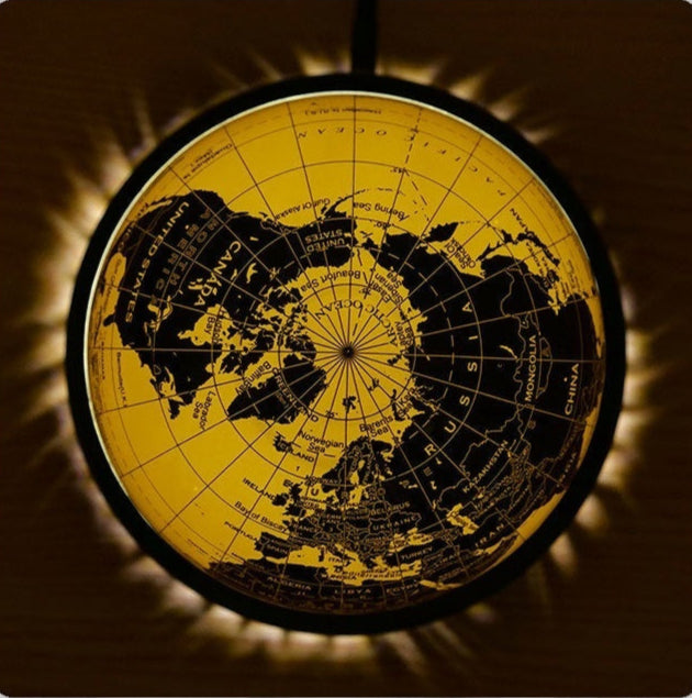 World map design with a warm glow on a dark background