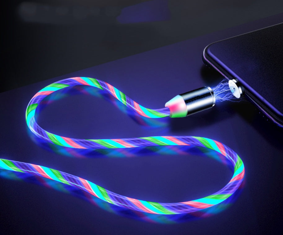 Colorful LED light-up charging cable on a dark surface with a phone.