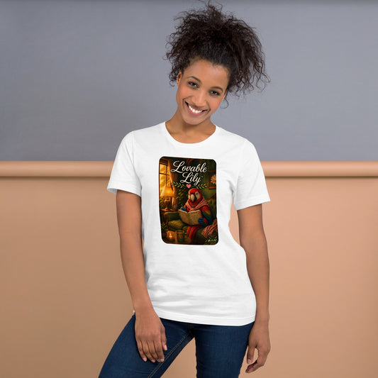A woman wearing a white short-sleeve graphic t-shirt with a 'Lazy Lily' cartoon illustration on the front, paired with blue jeans, standing against a two-tone gray and beige background.