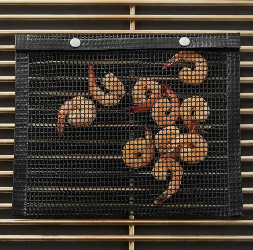 Decorative wall art with crabs on a black mesh background