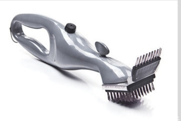 Metallic grill brush with bristle head on a white background