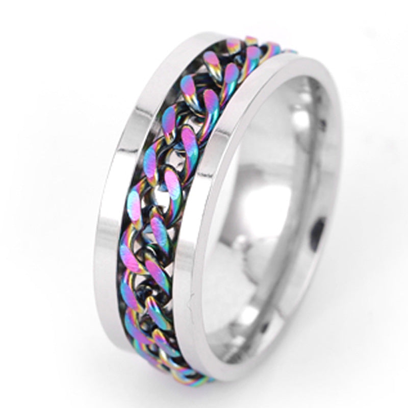 Silver ring with a colorful braided band on a white background