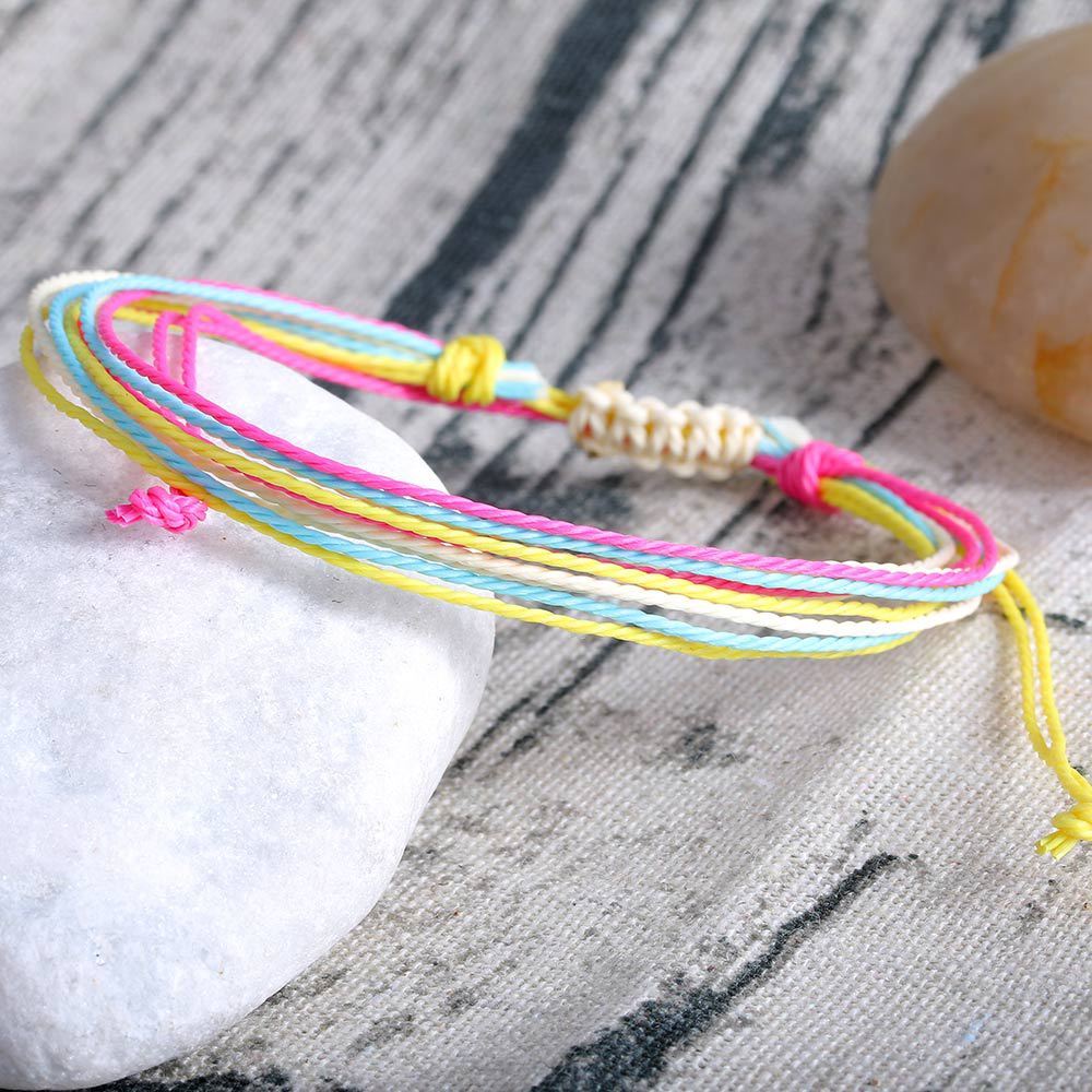 Multicolored bracelet on a textured surface