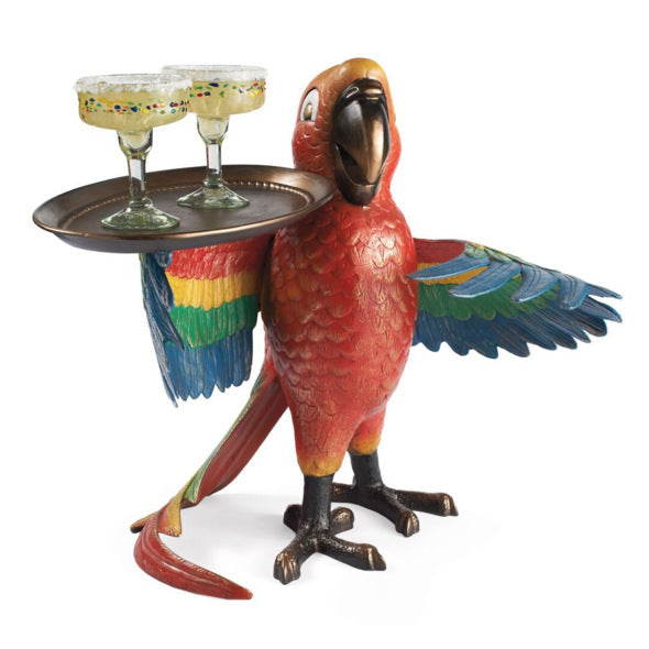Parrot figurine holding a tray with two margarita glasses on a white background