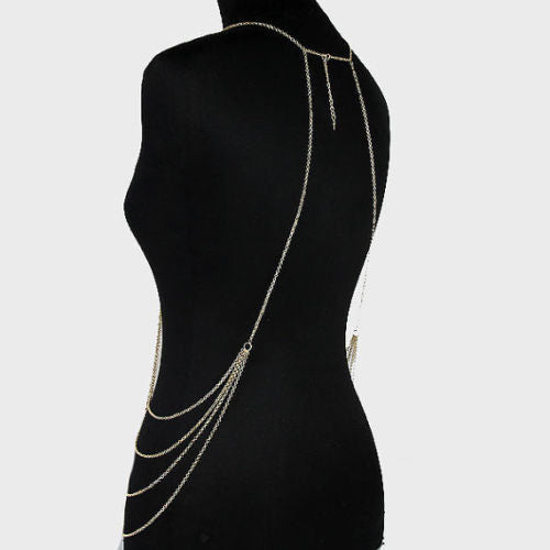 Body chain on a black mannequin against a white background
