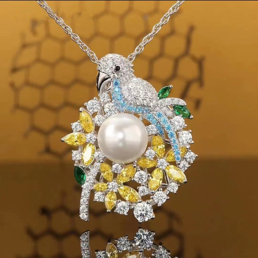 Delicate necklace with a parrot pendant and pearl on a honeycomb pattern background
