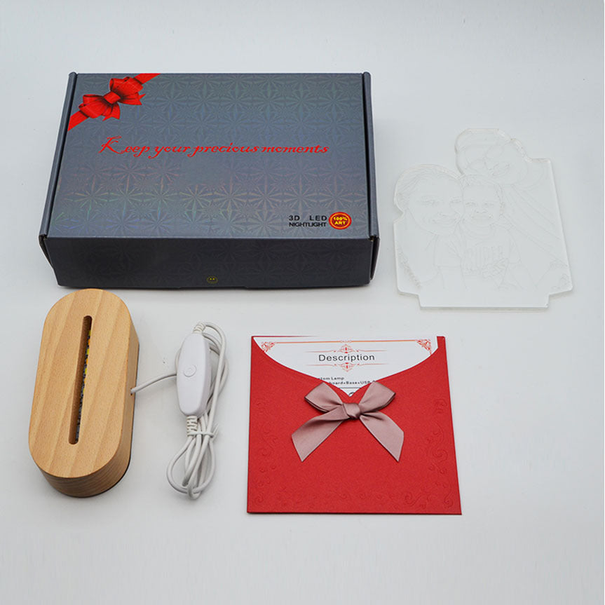 Product packaging with wooden item, cable, and red card on a white background