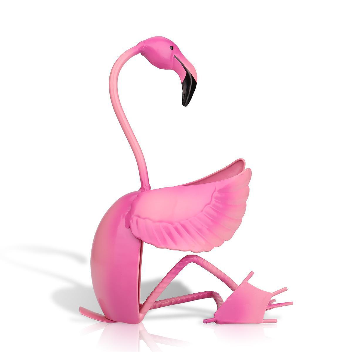 Pink flamingo figurine on a white background