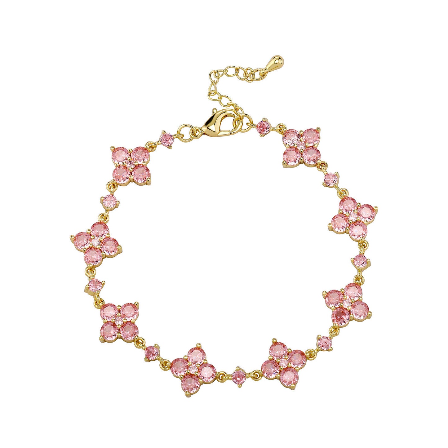 Gold bracelet with pink gemstones on a white background