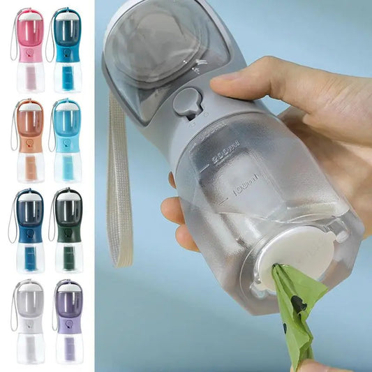 Portable pet water bottle with a hand holding it, showing different color options on the left.
