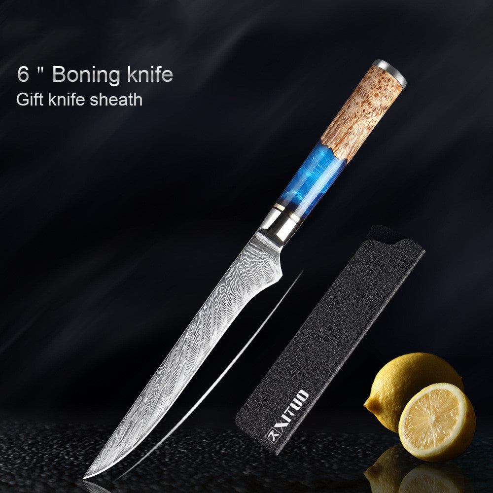 6-inch boning knife with cork handle and blue blade on a dark background with a knife sheath and lemons.