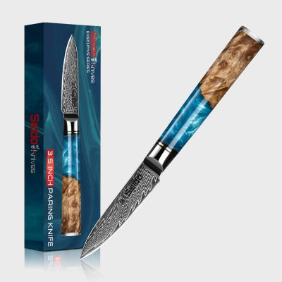  Damascus steel paring knife with wooden handle and branded packaging on a white background